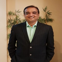 Dr.  Aniket